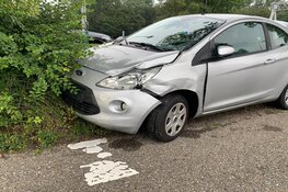 Auto te water na aanrijding