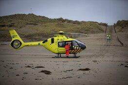 Fietser gereanimeerd op het strand