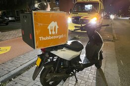 Maaltijdbezorger onderuit op de Spaarndamseweg in Haarlem