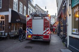 Brand in steenoven in Lange Veerstraat in Haarlem