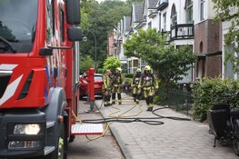 Brand in dak van woning in Haarlem