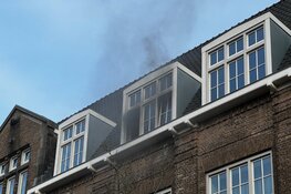 Brand door fietsaccu in woning in Haarlem
