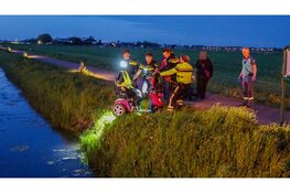 Persoon op scootmobiel te water in Heemskerk