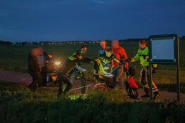 Persoon op scootmobiel te water in Heemskerk